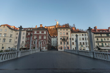 Bridge in the center of Ljubljana, the capital of Slovenia, with the castle in the background on the hill