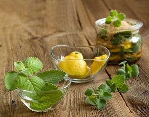 Homemade syrup made from fresh leaves of Plectranthus (Coleus) amboinicus, lemon slices and brown sugar. Traditional herb also known as Cuban oregano, syrup good for colds.
