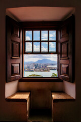 Classic shot from inside Convento da Penha, capturing the city of Vitória through the convent’s window. A must-have souvenir photo that highlights the historic and scenic charm.