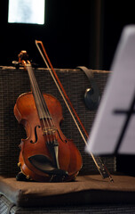 Fototapeta premium violin is recording studio on a chair