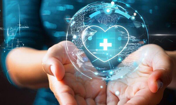 Hands holding a glowing health insurance symbol. Healthcare and medical welfare concept. Design for healthcare services and medical insurance articles with copy space. Conceptual composition