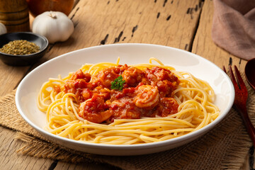 Spaghetti with Tomato Sauce and shrimp in white plate