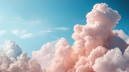 Pink and white clouds against a blue sky