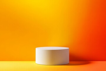 A clean white pedestal stands prominently against a bright orange and yellow gradient backdrop, creating a striking visual effect ideal for product displays