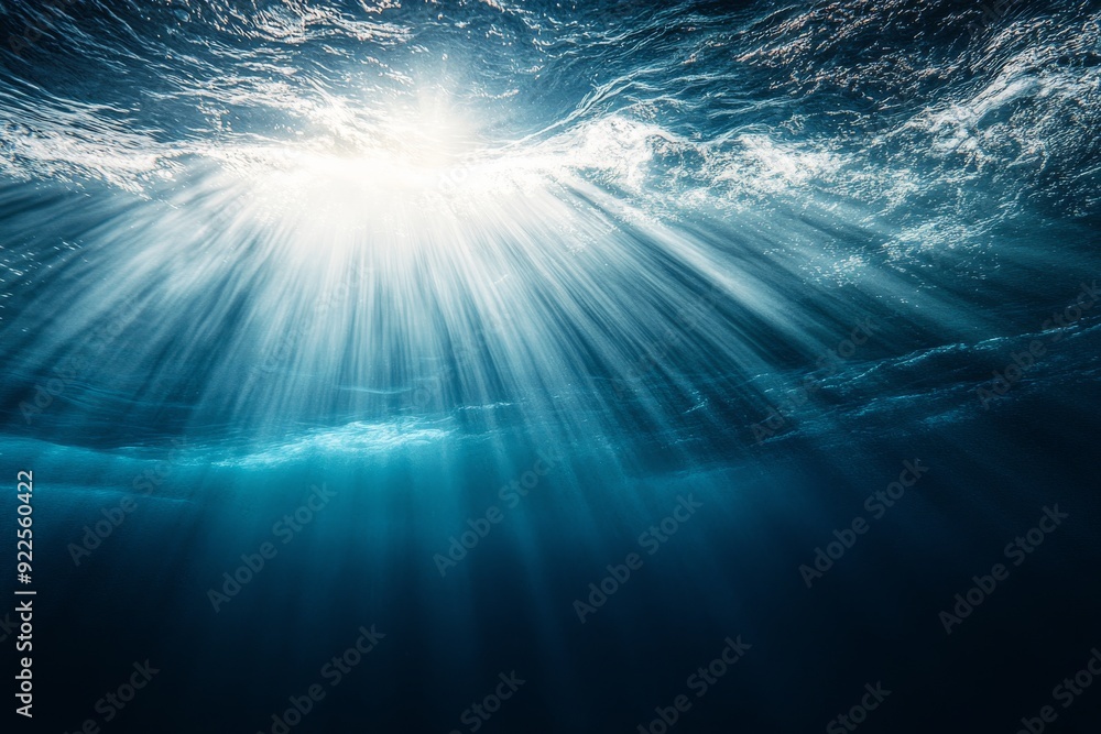 Poster sunlight filters through the water, highlighting the power of an ocean wave as it creates dynamic mo