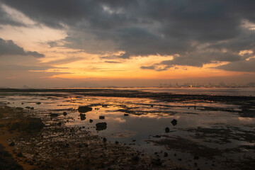 Sunset over mudflats in northern Hong Kong.