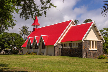Exposure of on of the most renowned churches in Mauritius is the Notre Dame Auxiliatrice Chapel, a Roman Catholic Church famous for its vivid red roof against the bright turquoise sea and azure sky