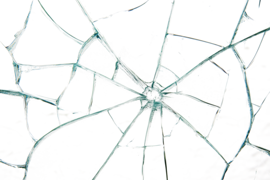 A close view of shattered glass displaying a complex pattern of cracks radiating from the center on a white background or PNG