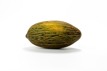 Green-yellow melon fruit with a brown spot on it on a white background. Melon fruits have a rough texture.