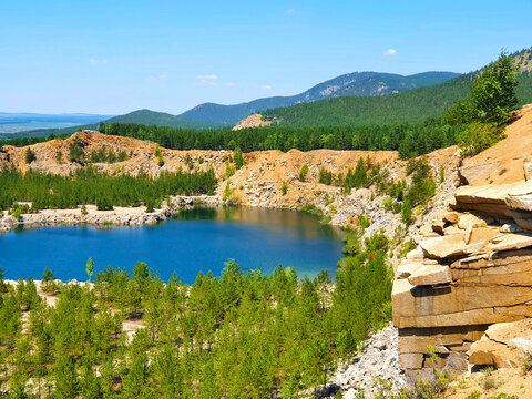 Burabay Lake in Central Kazakhstan: Tranquil popular place for swimming, hiking, picnicking and rock climbing. Beautiful lake among hills