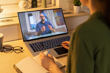 Close up of woman and using laptop. Online psychotherapy. Concept of remote work, e-commerce and freelancing