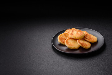 Delicious fresh sweet cheese pancakes with raisins and cinnamon