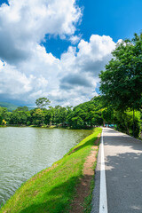 a public place leisure travel landscape lake views at Ang Kaew Chiang Mai University and Doi Suthep nature forest Mountain views spring cloudy sky background with white cloud.