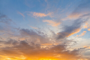 blue bright and orange yellow dramatic sunset sky in countryside texture background.