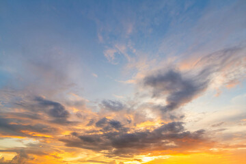 blue bright and orange yellow dramatic sunset sky in countryside texture background.