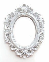 An ornate, white oval picture frame with intricate floral designs against a plain white background.