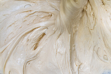 Background, texture of bread dough or pizza close-up. Copyspace