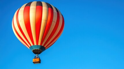 Naklejka premium A large hot air balloon flying in the sky with a small box attached, AI