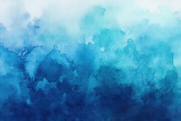 Obraz premium A stunning abstract watercolor painting with varying shades of blue, creating a serene and calming atmosphere.