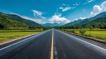 Fototapeta premium Serene Countryside Highway: Well-Maintained Road under a Clear Midday Sky