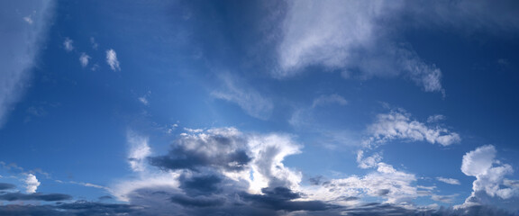 Obraz premium Real amazing panoramic sunrise or sunset sky with gentle colorful clouds. Long panorama.