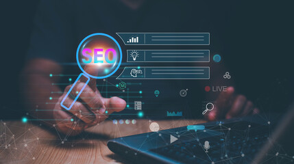 Businessman using finger pointing to magnifier icon for search information on internet, Search Engine optimization (SEO) concept, Surfing the internet to finding information on web browser.