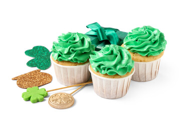 Tasty green cupcakes with gift box and decor for St. Patrick's Day on white background