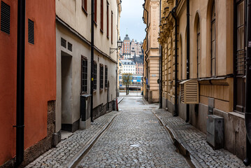 Sweden quaint cobblestone street in picturesque Gamla Stan, Stockholm's oldest neighborhood.