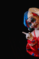 happy clown pointing with his finger