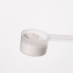 sugar in a spoon, proteine powder scoop