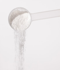 sugar in a spoon, proteine powder scoop