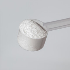 sugar in a spoon, proteine powder scoop