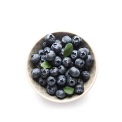 Bowl of ripe blueberry on white background, closeup