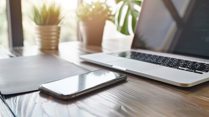 Modern Workspace with Laptop and Smartphone
