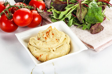 Creamy hummus in the bowl