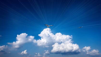 Obraz premium Rays shining behind the clouds