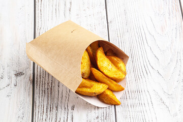 Fried rustic golden potato heap