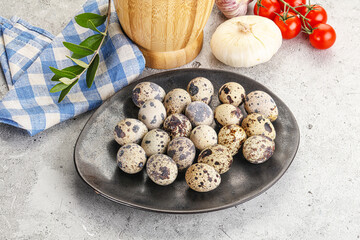 Raw quail eggs in the bowl