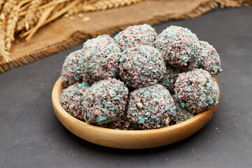 Colorful chocolate truffles with a crunchy coating, perfect for a festive and indulgent treat