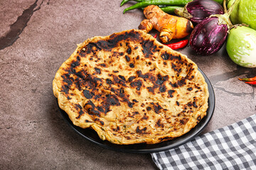 Indian cuisine stuffed Aloo paratha