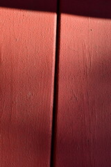 Fototapeta premium Red Paint on Deck Boards