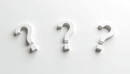 Three white question marks on a smooth white surface, casting subtle shadows.