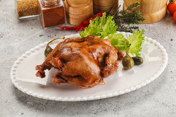 Baked small chicken with spices