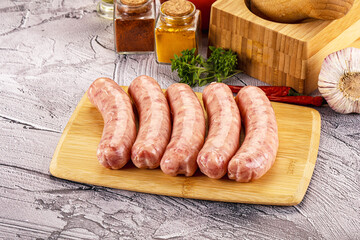 Raw meat sausages for grill