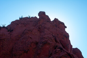 Natural erosion similar to a mountain with a blue sky in the background