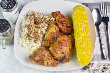 fried chicken  with rice top with soy sauce