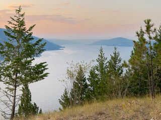 Okanagan Lake under a hazy evening sky 