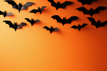 A collection of bats flying across a bright orange background, ideal for Halloween designs and decorations