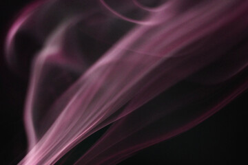 purple smoke on black background