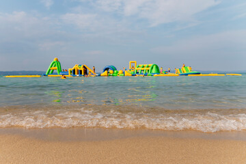 Children 's playground on the seawater on the beach